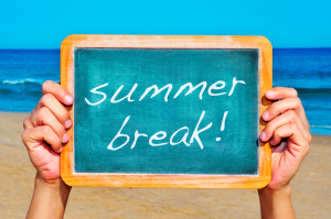 Summer break written on a chalkboard
